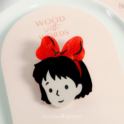Girl with Red Bow Brooch
