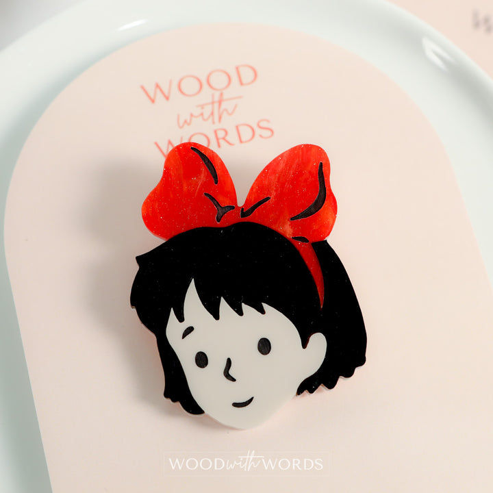 Girl with Red Bow Brooch