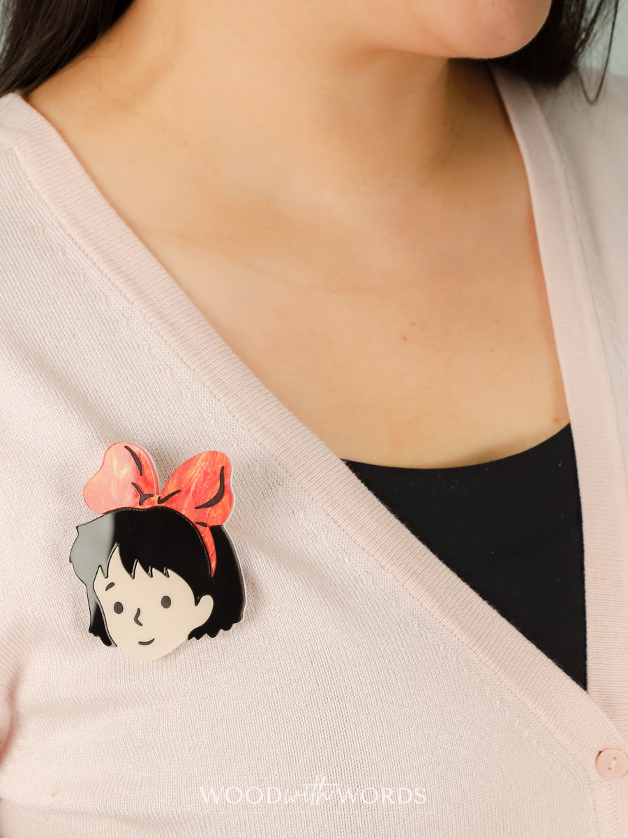 Girl with Red Bow Brooch