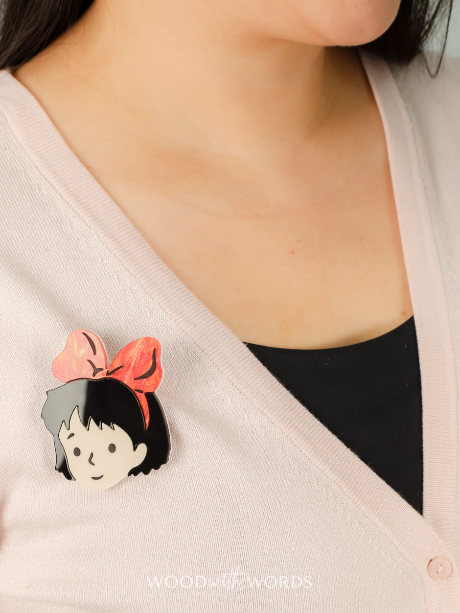 Girl with Red Bow Brooch